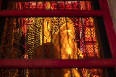 Statue in temple against building