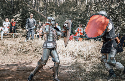 View of warrior standing on field