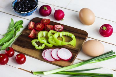 High angle view of chopped vegetables on cutting board