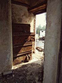 Abandoned house seen through window