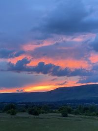 Scenic view of landscape against sky during sunset