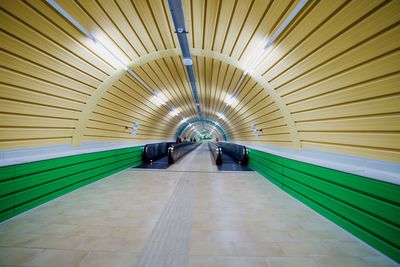 Interior of illuminated subway station