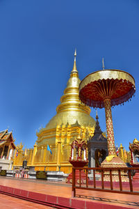 Low angle view of temple against building