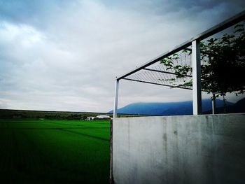 View of landscape against cloudy sky