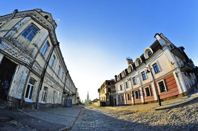 Low angle view of buildings against clear sky