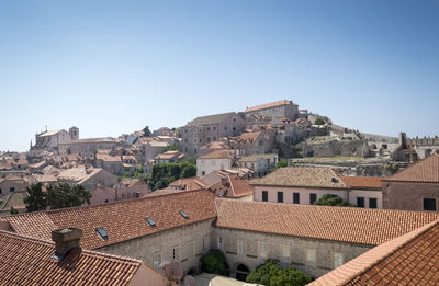 Town against clear sky