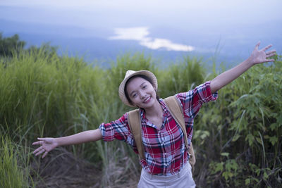 Happpy yoing girl at beautiful view point at phu pa po loei thailand.