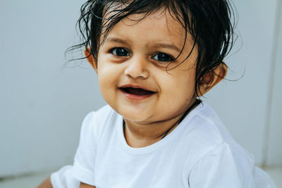 Portrait of cute girl at home