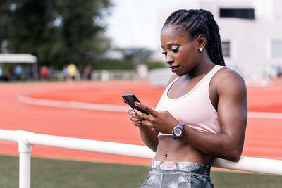 Young woman using mobile phone