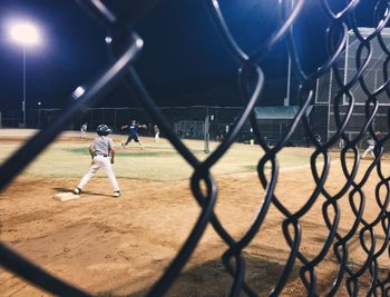 People playing basketball in sky