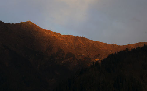 Low angle view of mountains against sky