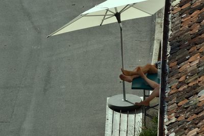 Man holding umbrella