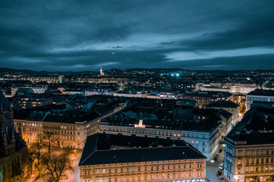 High angle view of city against cloudy sky