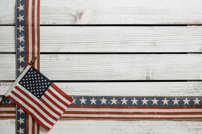 Red flag on wooden wall