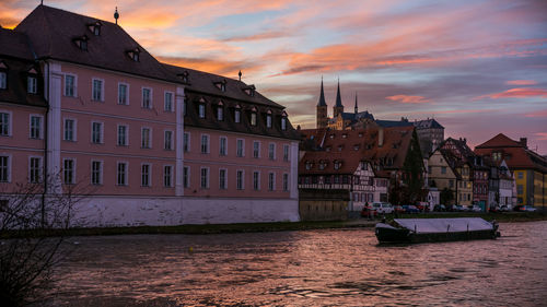 Buildings in city at dusk