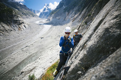 Climbers exploring mountains