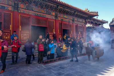 Group of people in front of building