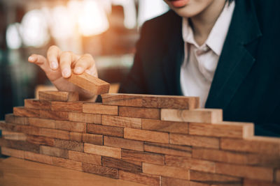 Close-up of man working on wood