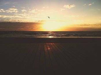 Scenic view of sea at sunset