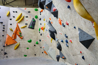 Bouldering gym with artificial colourful rock wall