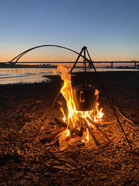 Making tea on the river coast