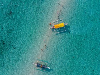 Aerial view of outrigger boats at sea