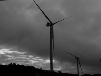 Low angle view of wind turbine against sky