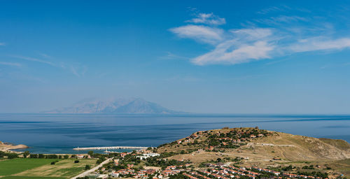 Scenic view of imbros island by sea against sky