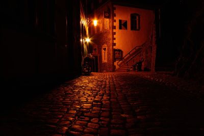 Illuminated road at night