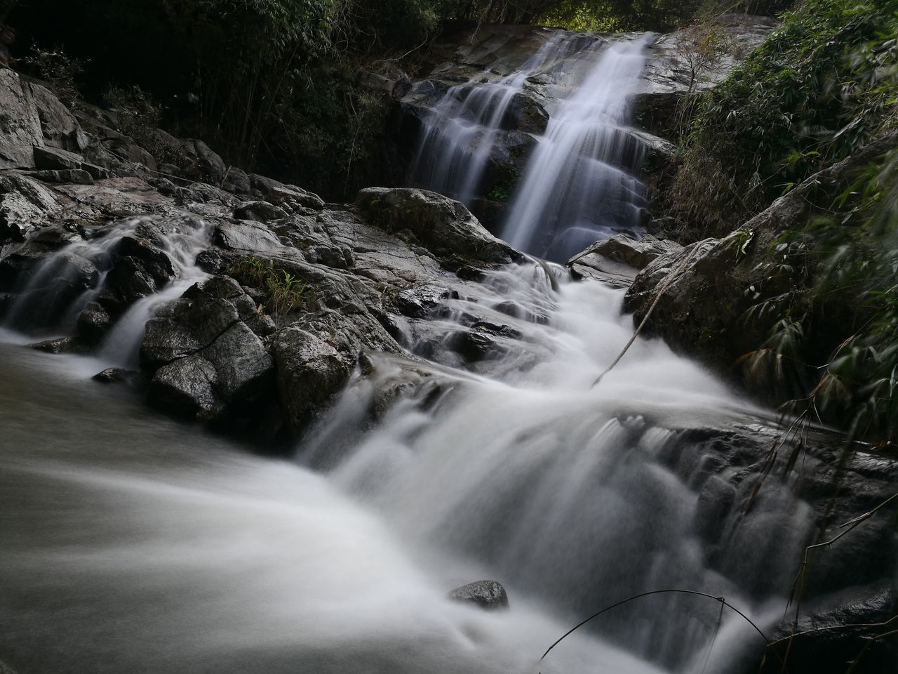 SCENIC VIEW OF WATERFALL