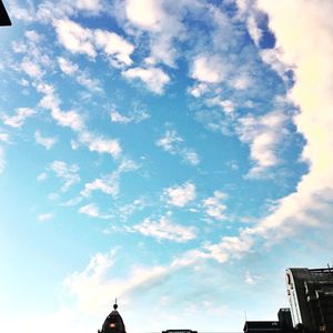 High section of building against cloudy sky