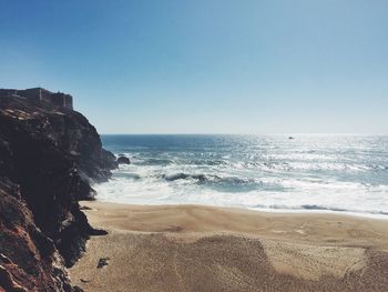 Scenic view of sea against clear sky