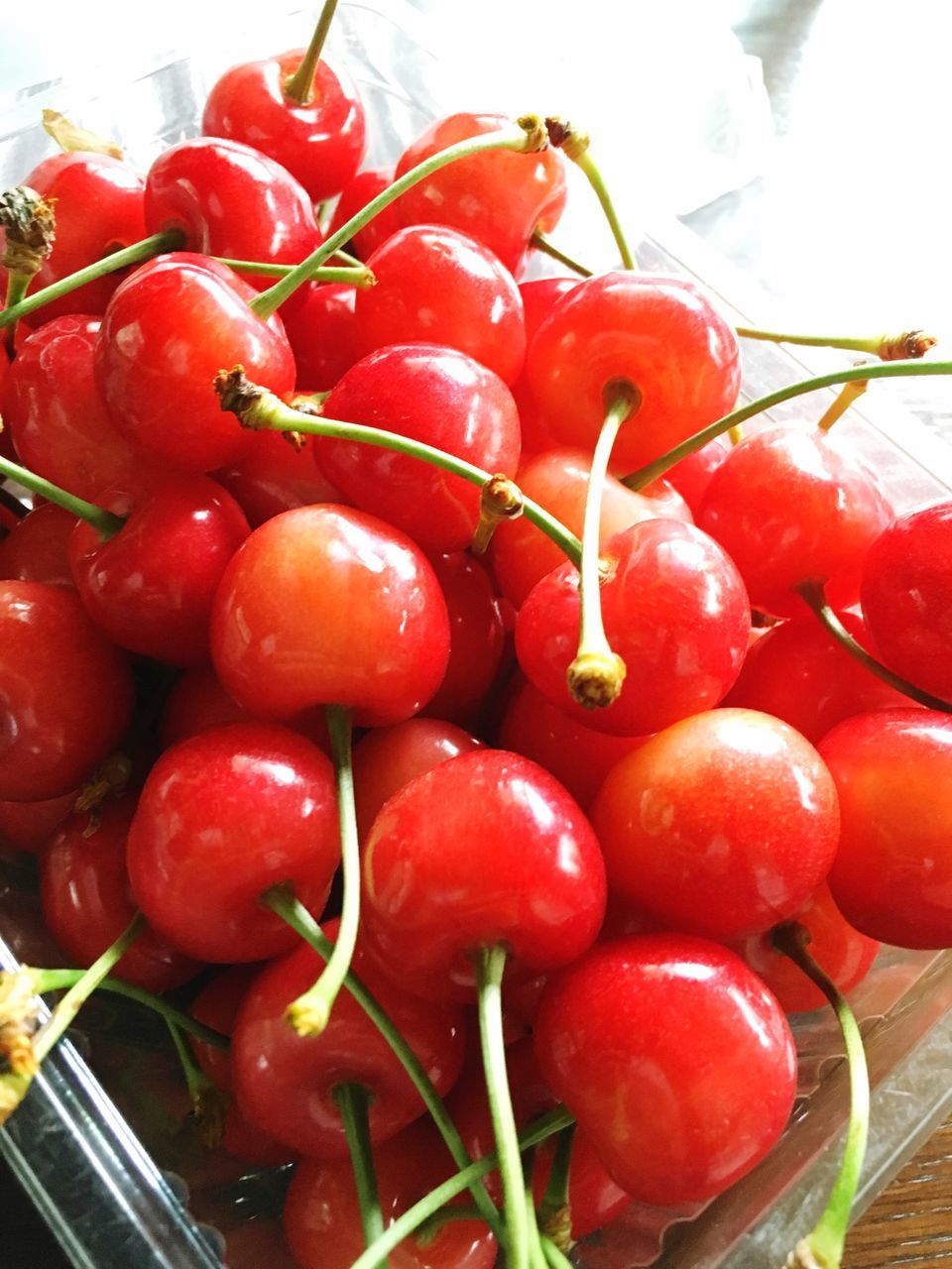 food and drink, red, freshness, food, healthy eating, fruit, close-up, tomato, vegetable, strawberry, ripe, organic, stem, still life, high angle view, raw food, no people, juicy, cherry, day