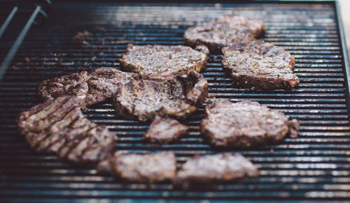 Close-up of meat on barbecue grill