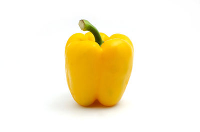 Close-up of yellow bell pepper against white background