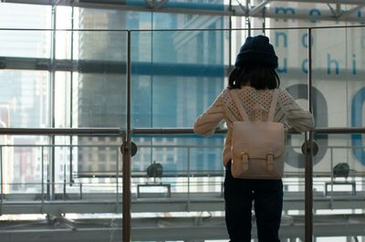 Woman standing in city