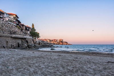 View of beach against sky during sunset