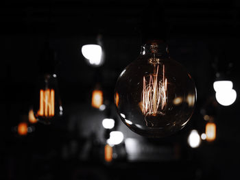 Close-up of illuminated light bulb