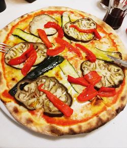 High angle view of pizza in plate on table