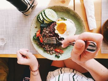 High angle view of man preparing food