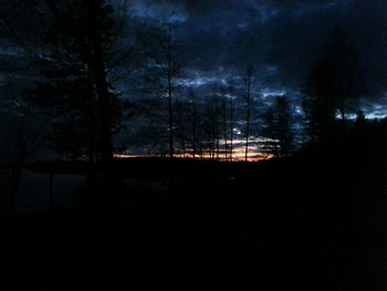 Scenic view of landscape against sky at sunset