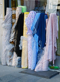 Colorful fabrics for sale on footpath