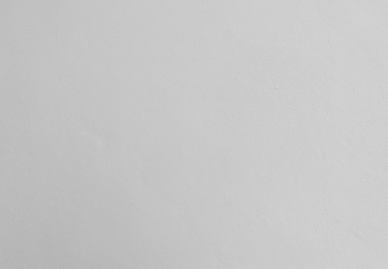 CLOSE-UP OF WHITE WALL