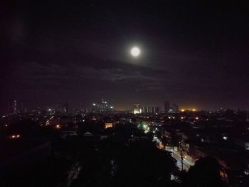 Illuminated cityscape at night