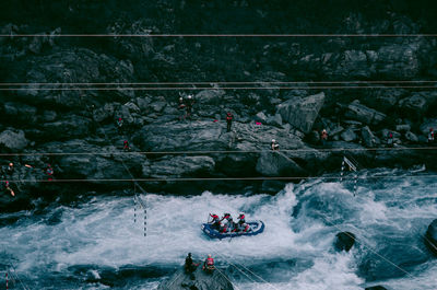 High angle view of people rafting on river