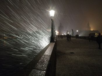 People on beach at night