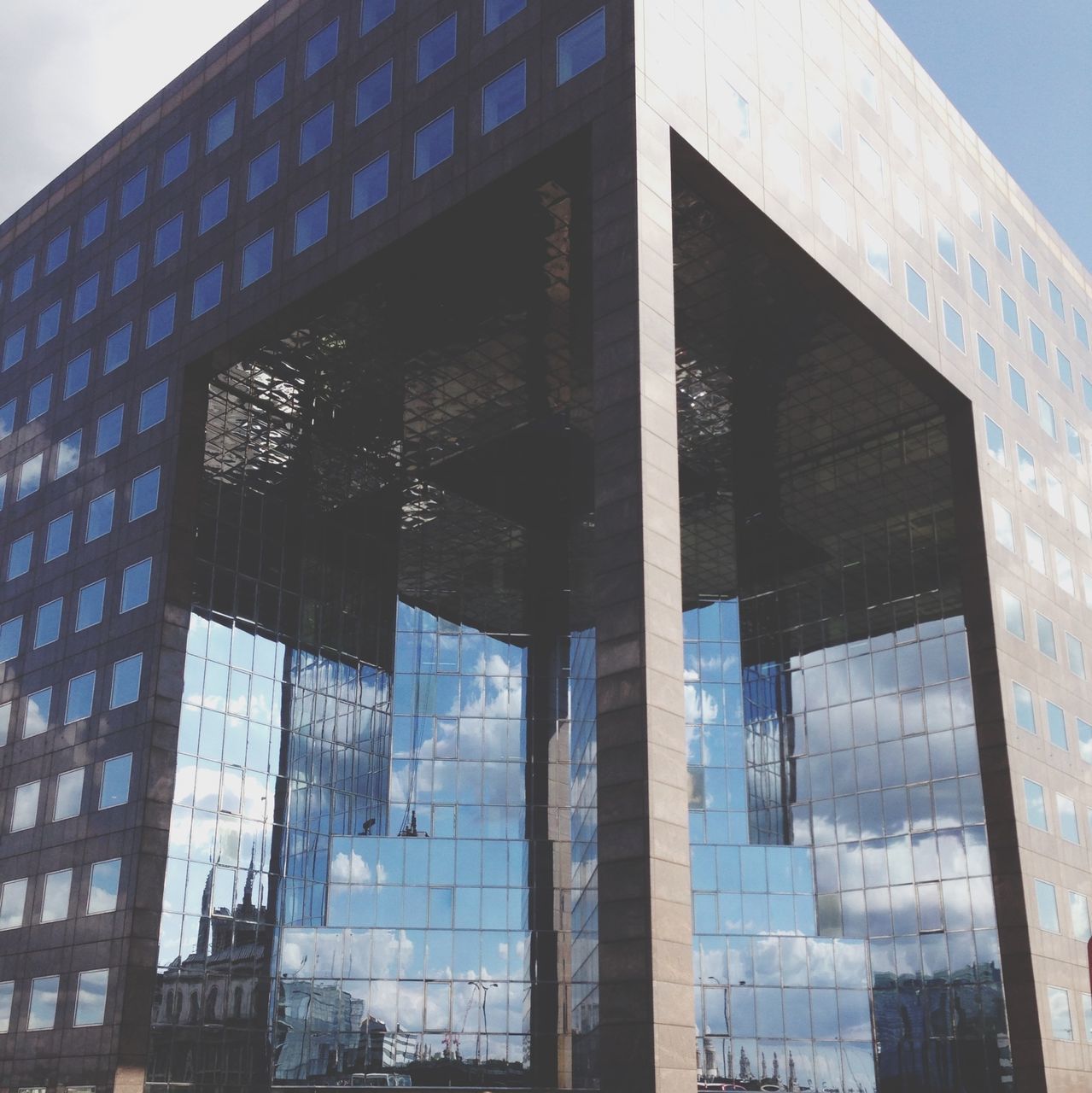 architecture, building exterior, built structure, low angle view, glass - material, window, reflection, building, city, modern, office building, sky, residential building, day, residential structure, outdoors, no people, blue, glass, transparent