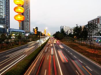 High angle view of light trails on road in city