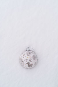 High angle view of christmas decoration on snow