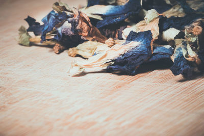 High angle view of dry plants on wooden table